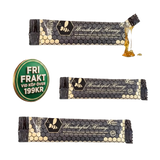 Enskild portionspåse med honung, svart förpackning med bikakedesign, fri frakt-märke.